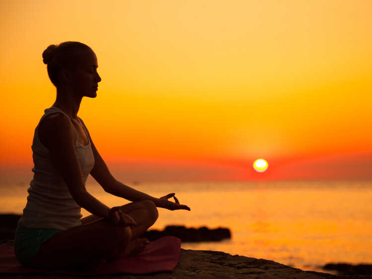 Mindful meditation and peaceful wellness restoration in natural surroundings